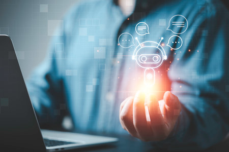 Businessman holding artificial Intelligence digital chatbot icon with message for AI  innovation technology to provide information data concept.の写真素材