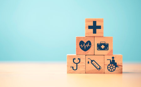 Health care and medical icons print screen on wooden block  for healthy wellness insurance and assurance concept.の写真素材