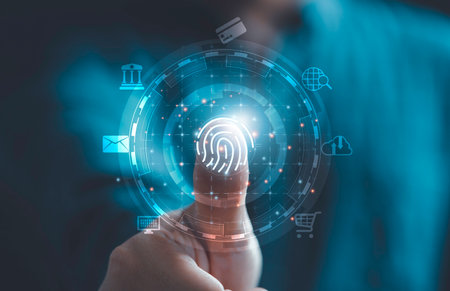 Businessman hand thumb rise up with virtual finger print and tech icon including cloud computing mobile banking and computer laptop for technology security and identity password concept.の写真素材