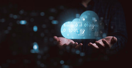 Businessman holding and giving virtual cloud computing with copy space to transfer data information and upload download application. Technology transformation concept.の写真素材