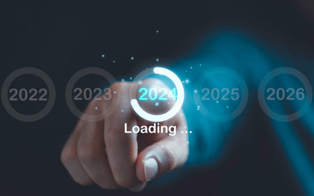Businessman touching virtual 2024 number and download  for merry Christmas and happy new year by technology concept.の写真素材