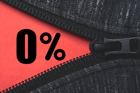 Black Zip to open zero percentage on red background for special offer of shopping department store discount and banking interest rate concept.の写真素材