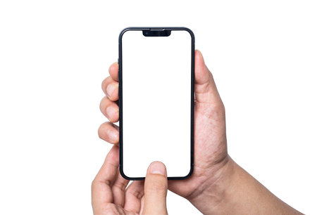 Isolation of Hand holding  blank screen of smartphone on white background with clipping path for mockup advertisement and social icon.の写真素材