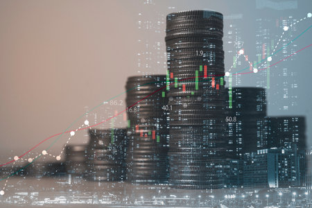 Double exposure of skyscraper with coins stacking and stock market for investment and business profit concept.の写真素材