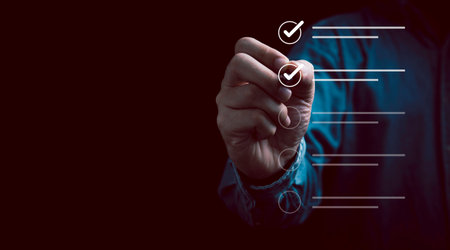 Businessman using pen to tick correct sign mark in checkbox for quality document control checklist and business approve project concept.の写真素材