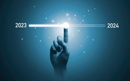 Hand touching on download bar status to change from 2023 to 2024  for countdown of merry Christmas...