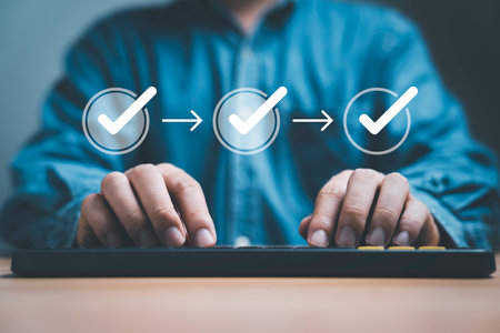 Businessman typing with approval work flow for online business management review , project and document approve concept.の写真素材