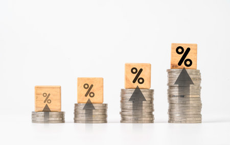 Increasing of coins money stacking with up arrow and percentage symbol for financial banking...