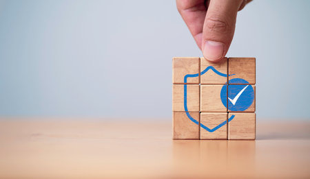 Correct sign or tick mark symbol on wooden block cube for verify code before access concept.