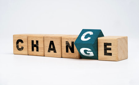 Flipping of wooden block cube to adjust between change wording to chance wording for growth attitude and positive mindset of personal development concept.の写真素材
