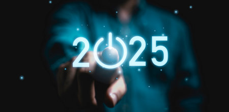 Businessman touching to virtual start button icon with 2025 for start merry Christmas and happy new...
