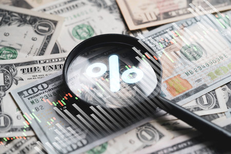 Magnifier glass to focus on 100 USD dollar banknote with update and down arrow for Federal or FED increase and decrease percentage of interest to reduce inflation crisis concept.の写真素材