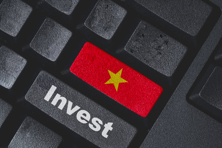 Vietnam flag print screen on computer keyboard button for Vietnam investment concept.の写真素材