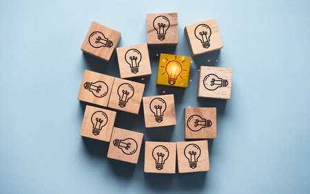 Glowing light bulb among normal lamp for focus and concentrate of creative thinking idea and problem...