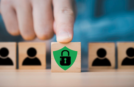 Hand pushing master key lock with guard icon in front of human icon for Personal Data Protection Act or PDPA and cyber privacy security information concept.の写真素材