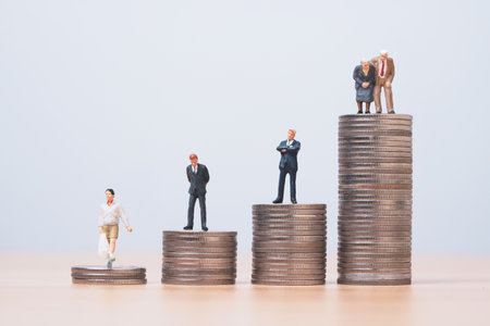 Human generation standing on the top of coins stacking include  teenage Middle-Age Senior businessman and grandparent , business in investment and money saving in each generation concept.の写真素材