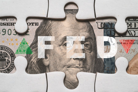 FED wording with up and down arrow on USD dollar banknote for Federal reserve increase and decrease interest rate control which effect to America and world economic growth concept.の写真素材