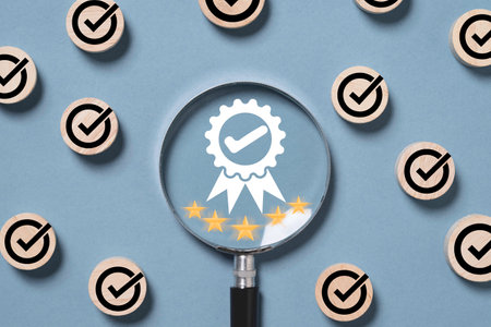 Best quality assurance and golden five stars inside of magnifier glass with correct sign mark  for focus guarantee product and ISO service concept.の写真素材