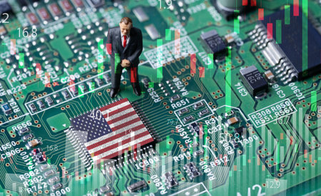Businessman standing on electronic board with USA flag microchip and stock market for Investor mega trend of chip and Artificial Intelligent or AI concept.の写真素材