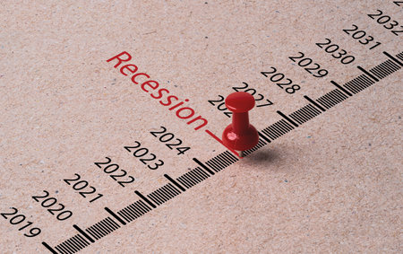 Red pin push to recession wording time scale on brown paper for economic depression will occur in 2025 concept.の写真素材
