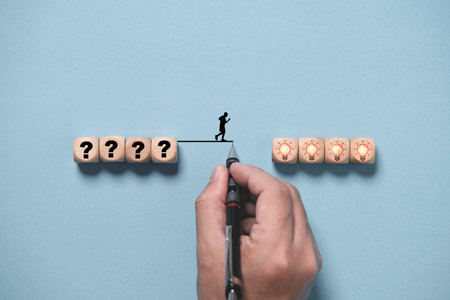 Hand writing line to connect between question mark and glowing lightbulb for creative thinking idea and problem solving concept.の写真素材