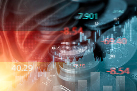 Double exposure of Germany flag on coins stacking and stock market graph chart .It is symbol of Germany high growth economy and investment  technology concept.の写真素材