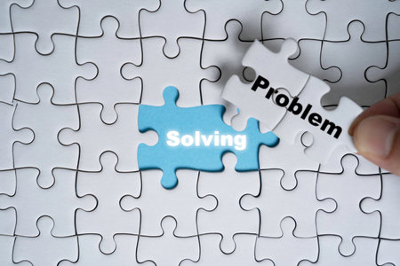 Hand move out problem wording on jigsaw and found solving wording for solution concept.の写真素材