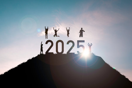 Silhouette of many human standing and jump on 2025 and the top of mountain blue sky and sunlight for start of new business year and challenge concept.の写真素材