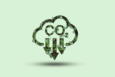 Green leafs inside of CO2 reducing icon for decrease CO2 , carbon footprint and carbon credit to limit global warming from climate change, Bio Circular Green Economy concept.の写真素材