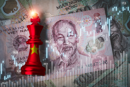 Dong banknotes with stock market graph chat and Vietnam chess for Vietnam country is new born economy and high business development growth from many investment concept.の写真素材