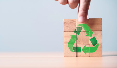 Hand giving recycle icon print screen on increasing coins stacking with plus sign for Reuse reduce and recycle to reservation environment and increase business profit concept.の写真素材