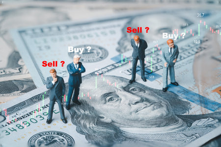 Businessmen miniature figure standing on USD dollar banknotes with buy and sell wording for...