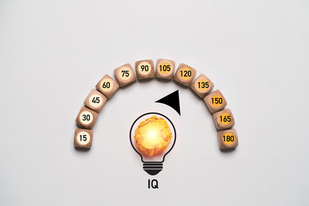 Yellow scrap paper inside glowing lightbulbs with instruments gauge for IQ or intelligence quotient scale of creative thinking idea and problem solving solution concept.の写真素材