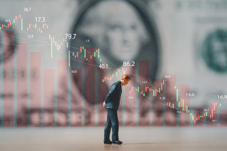 Miniature figure standing with USD banknote and stock market graph chart for United States of America have economic recession crisis conceptの写真素材