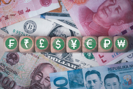 International banknotes with currency sign include dollar euro yen yuan pound sterling won ruble and rupee for money transfer and trade forex concept.の写真素材