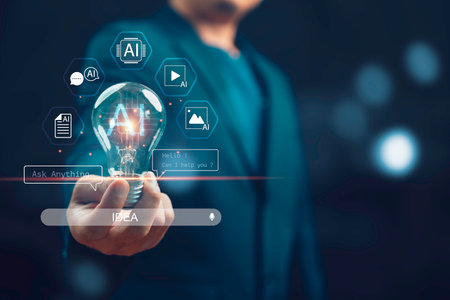 Businessman holding light bulb with AI technology icons, innovation and artificial intelligence concept for future digital transformation, creative idea, machine learning, and smart solutions.の写真素材