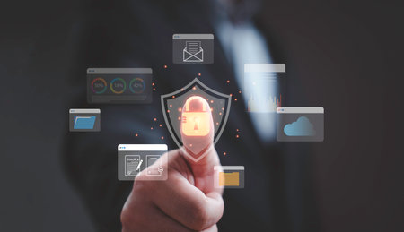 Businessman pressing virtual lock icon with data protection symbols representing cybersecurity,...
