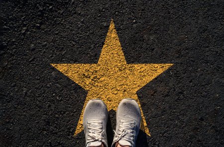 Talent concept with person standing on yellow star symbol represents personal potential success...