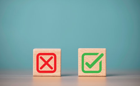 Green correct sign mark and Red incorrect cross sign mark print screen on wooden block cube for...