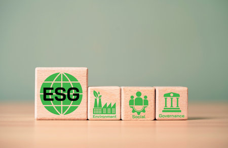 ESG environment social governance icons on wooden blocks representing sustainable business, ethical...