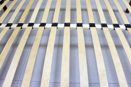 lacquered red wooden double bed with orthopedic slatsの写真素材