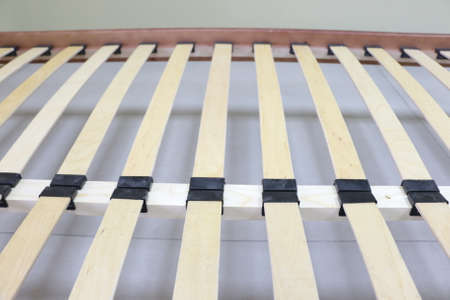 lacquered red wooden double bed with orthopedic slatsの写真素材