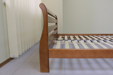 frame of a double wooden bedの写真素材