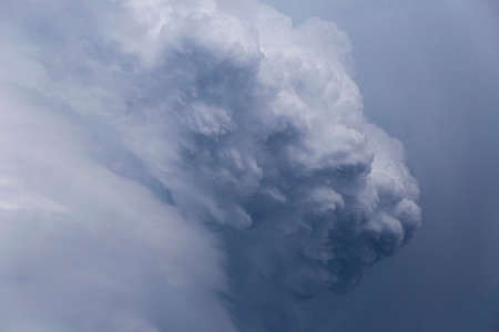 clouds form an abstract silhouette of a male profileの写真素材