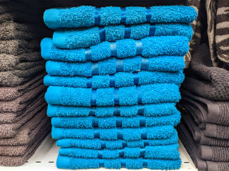 blue towels stacked in a pileの写真素材