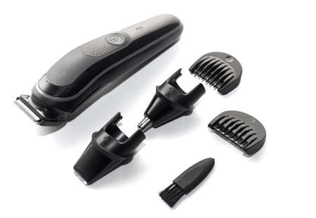 A set of the cordless electric hair clipper isolated on the white backgroundの写真素材