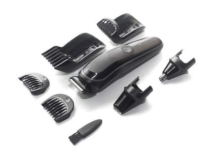 A set of the cordless electric hair clipper isolated on the white backgroundの写真素材