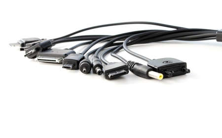 different types of charger connectors for phones, on a white backgroundの写真素材