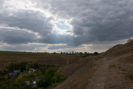 rays of light broke through thick clouds, the concept of an idea or hopeの写真素材