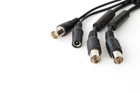 wires for transmitting analog video from surveillance cameras on white isolated